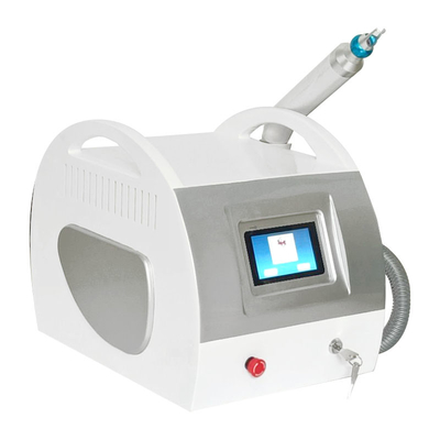 Mini máquina portátil de eliminación de tatuajes Nd Yag Q con láser para salón de belleza